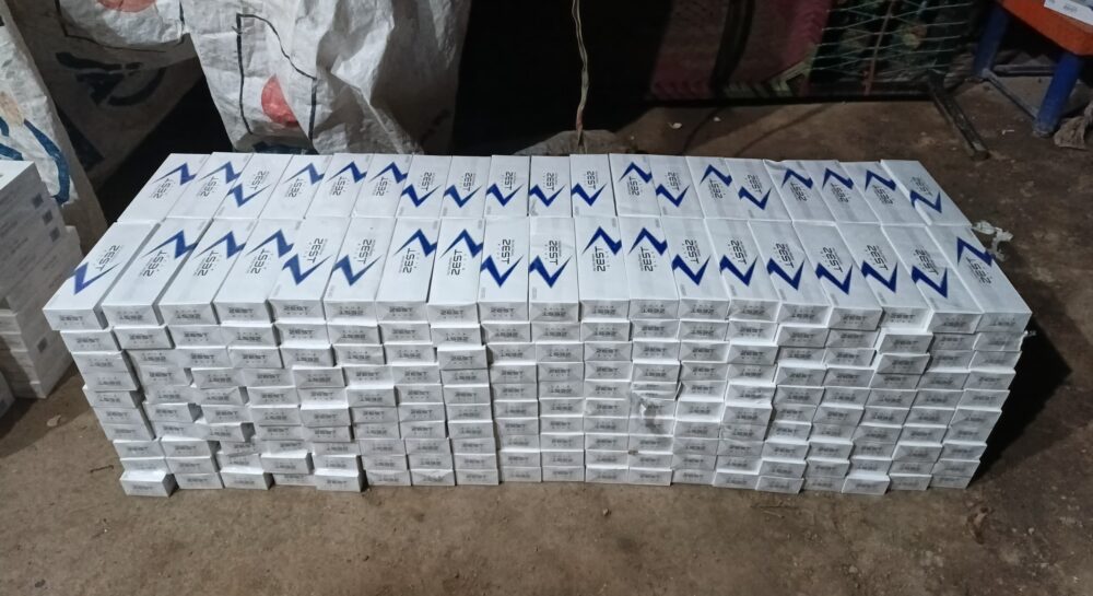 Customs Enforcement, Peshawar officials inspecting seized non-duty-paid vehicles