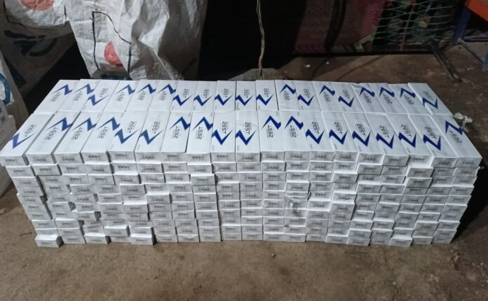 Customs Enforcement, Peshawar officials inspecting seized non-duty-paid vehicles