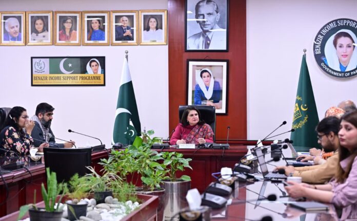 Beneficiaries receiving Benazir Kafalat payment under BISP in Pakistan.