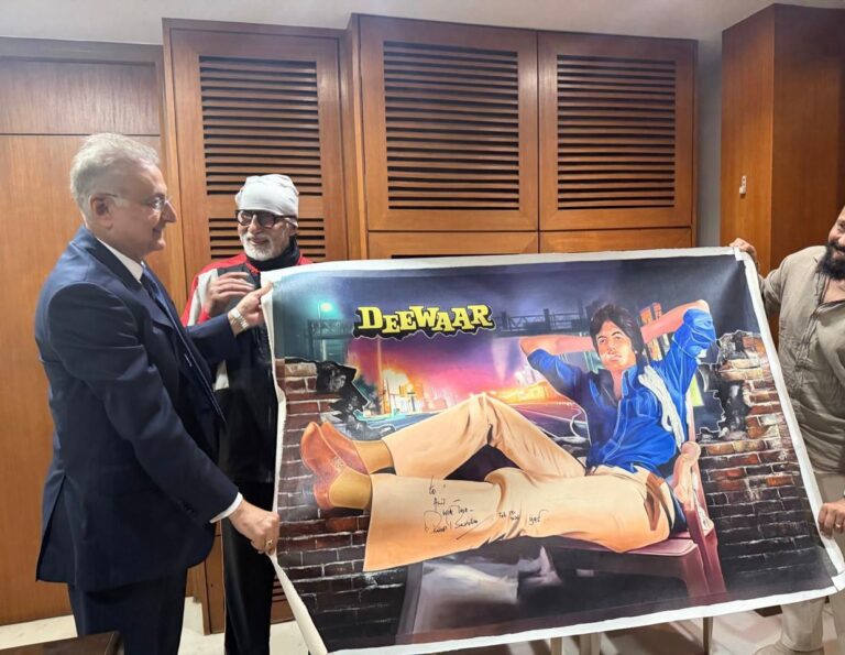 Amitabh Bachchan with signed Deewaar canvas