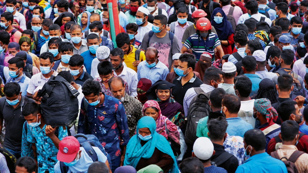 A busy public area in Pakistan reflecting rapid population growth trends