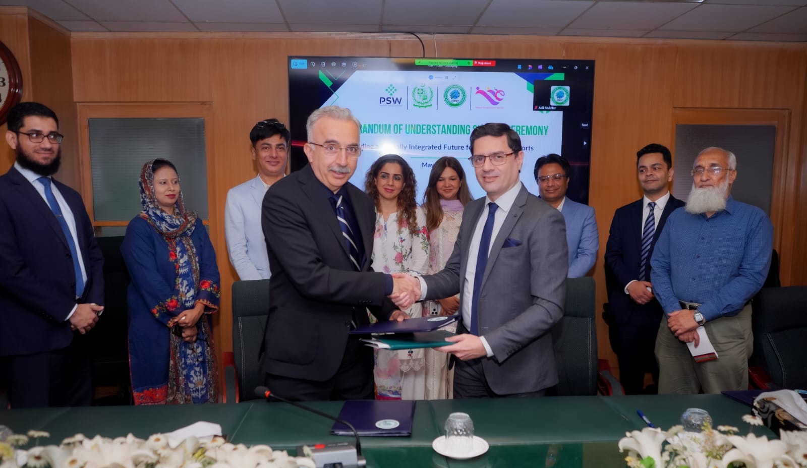 Officials sign the PSW and TDAP agreement for digital trade and export growth in Karachi.