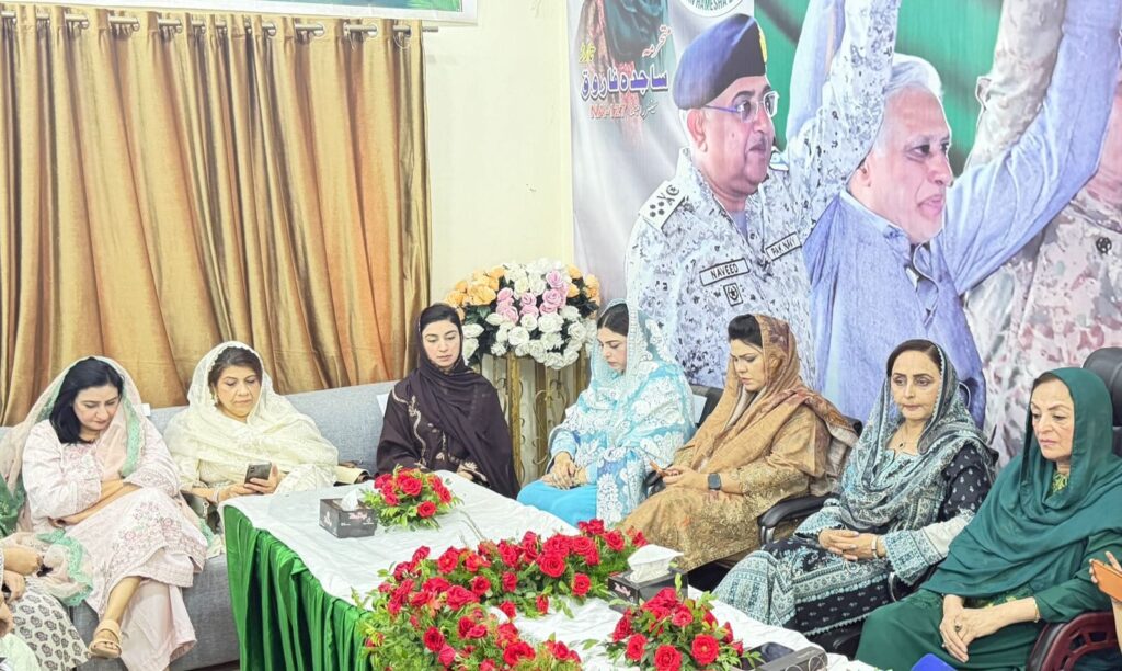Participants attending an anniversary ceremony marking Maarka-e-Haq and Bunyan-un-Marsoos in Lahore, Pakistan.