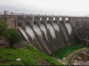 Rawal Dam spillways during controlled water release after monsoon rainfall in Islamabad.